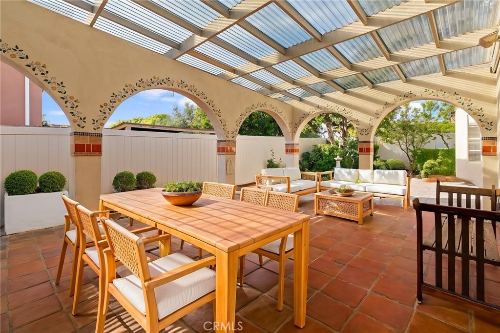 5385 Strasbourg Avenue Irvine, CA 92604 - Photo 4 of 59 a view of a patio with table and chairs and potted plants