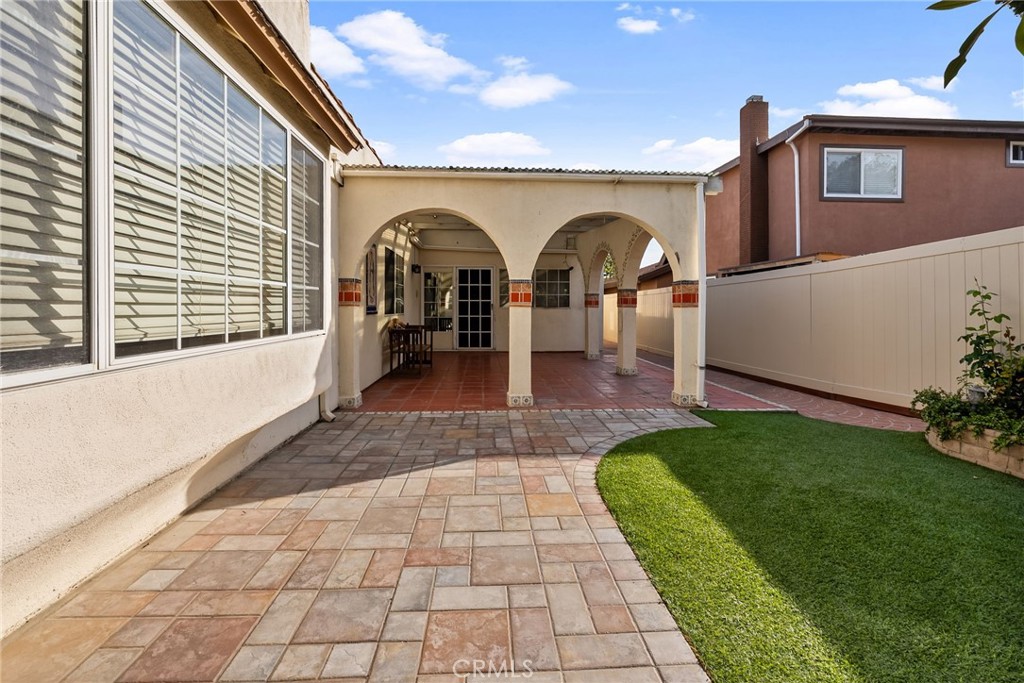 5385 Strasbourg Avenue Irvine, CA 92604 - Photo 52 of 59 a front view of a house with garden