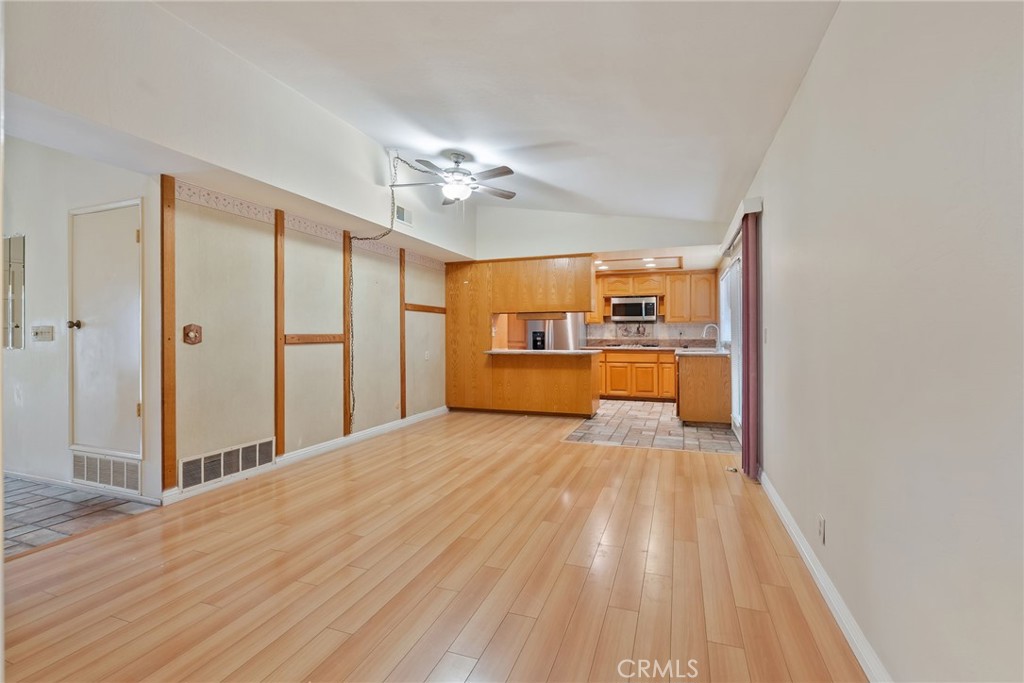 5385 Strasbourg Avenue Irvine, CA 92604 - Photo 9 of 59 a view of a kitchen with a sink and a refrigerator