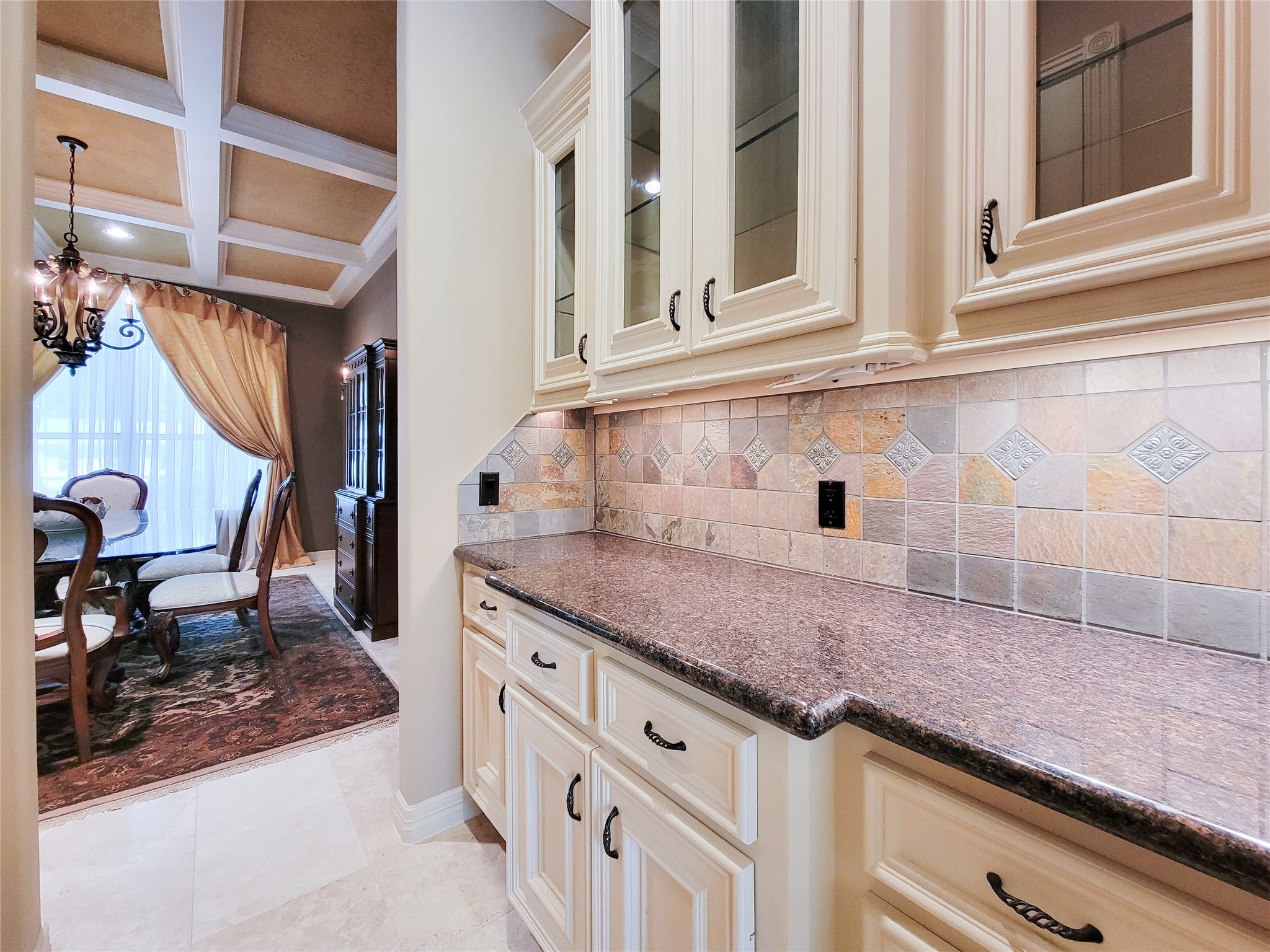 1118 Colonial Street Bellaire, TX 77401 - Photo 13 of 50 Butler's Pantry with undercounter lighting and granite countertops.