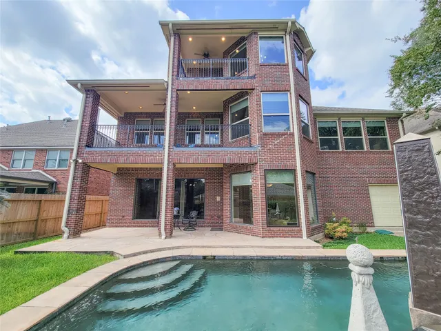 a front view of a house with a glass door