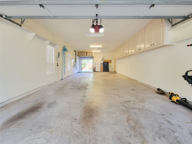 a view of house with a yard