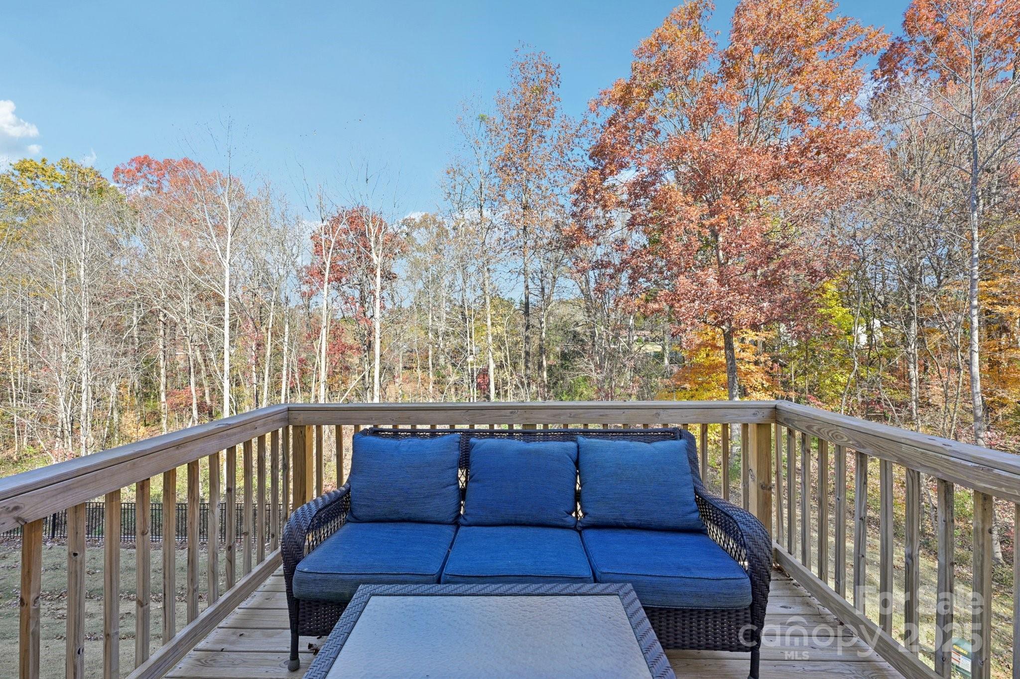 2932 Pirates Place Charlotte, NC 28216 - Photo 28 of 32 a view of a balcony with wooden floor and fence