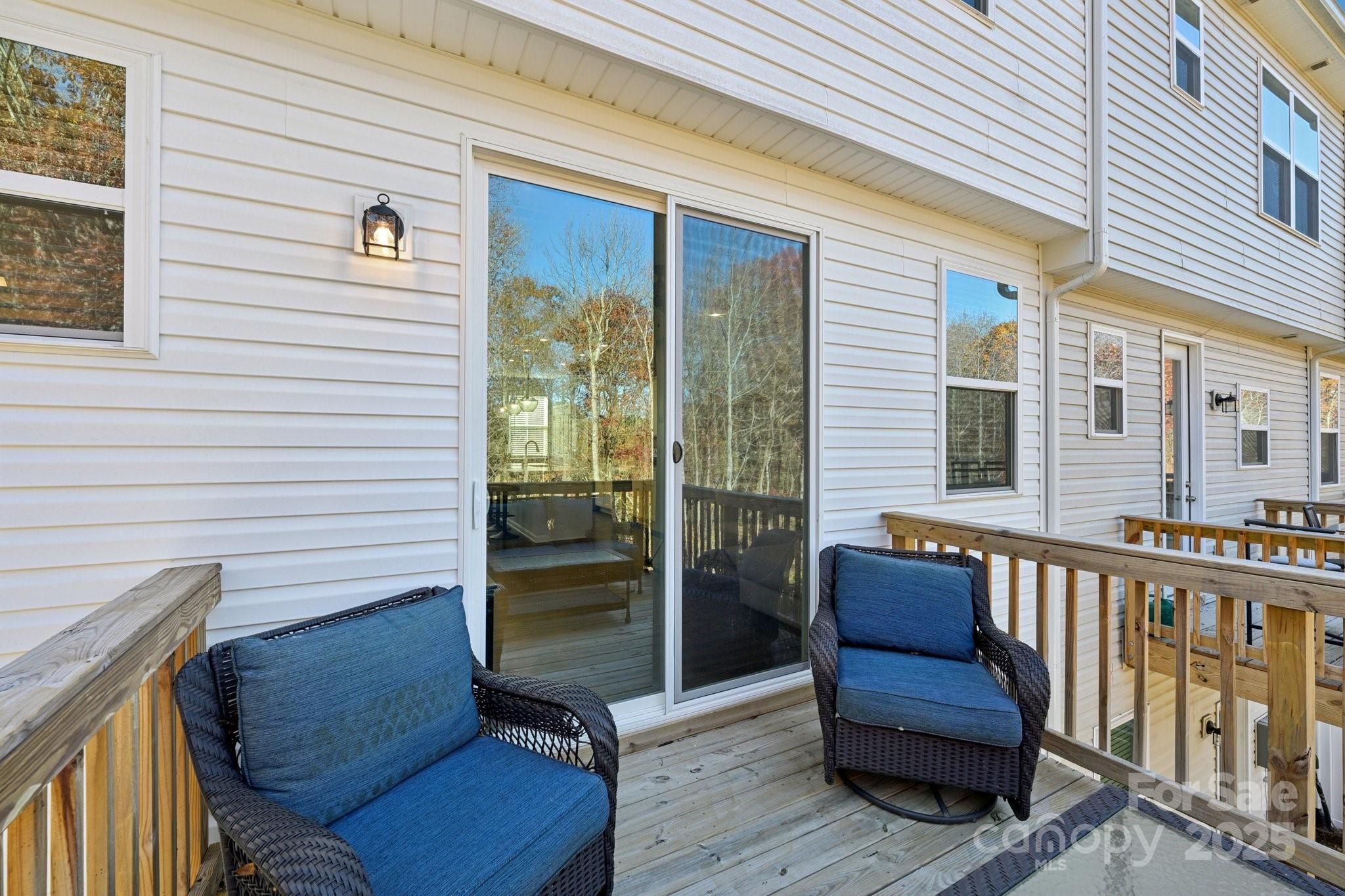 2932 Pirates Place Charlotte, NC 28216 - Photo 29 of 32 a view of a two chairs in the balcony