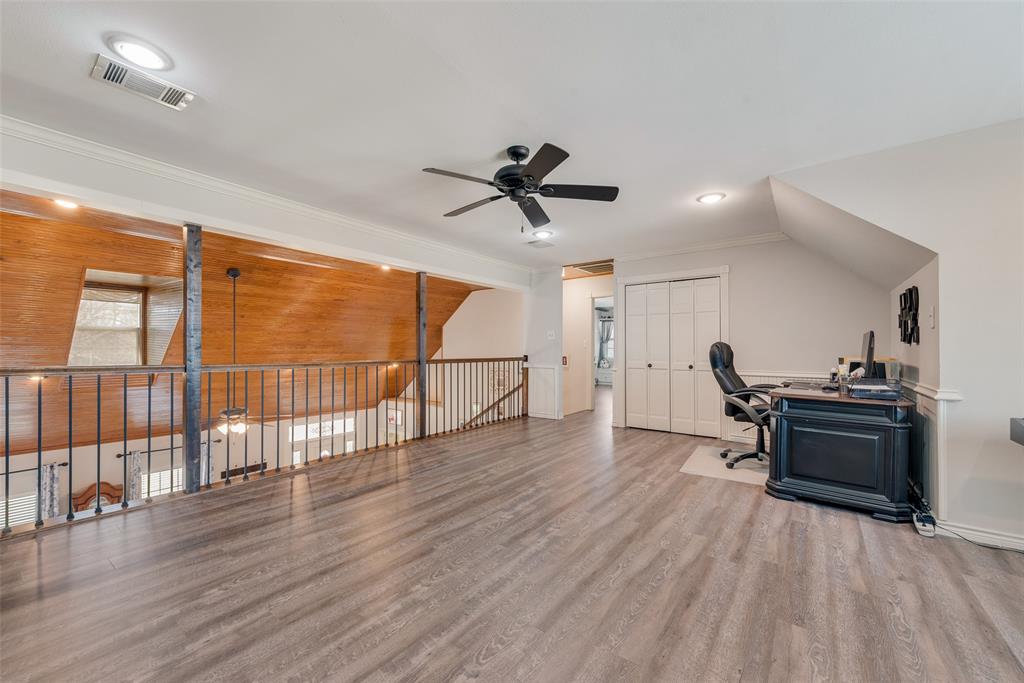 669 VZ County Road Canton, TX 75103 - Photo 37 of 40 a view of a work space with furniture wooden floor and a ceiling fan