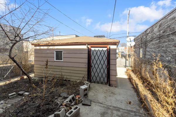2016 West Superior Street Chicago, IL 60612 - Photo 8 of 16 a view of a house with a yard