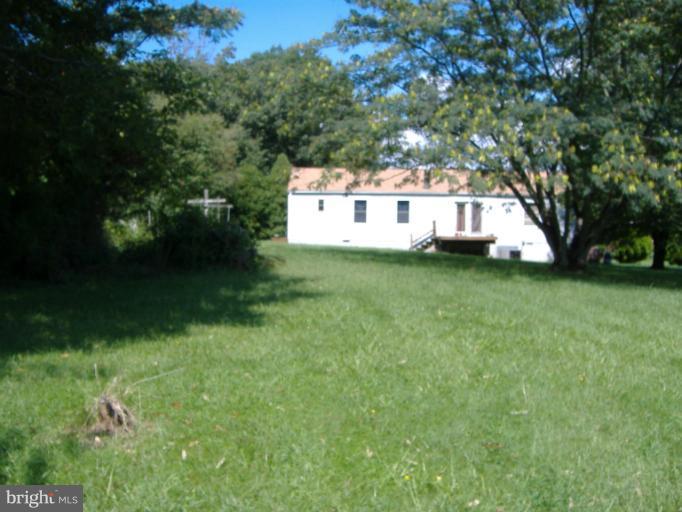 9191 Fletchers Chapel Road King George, VA 22485 - Photo 1 of 6 Exterior (Rear)