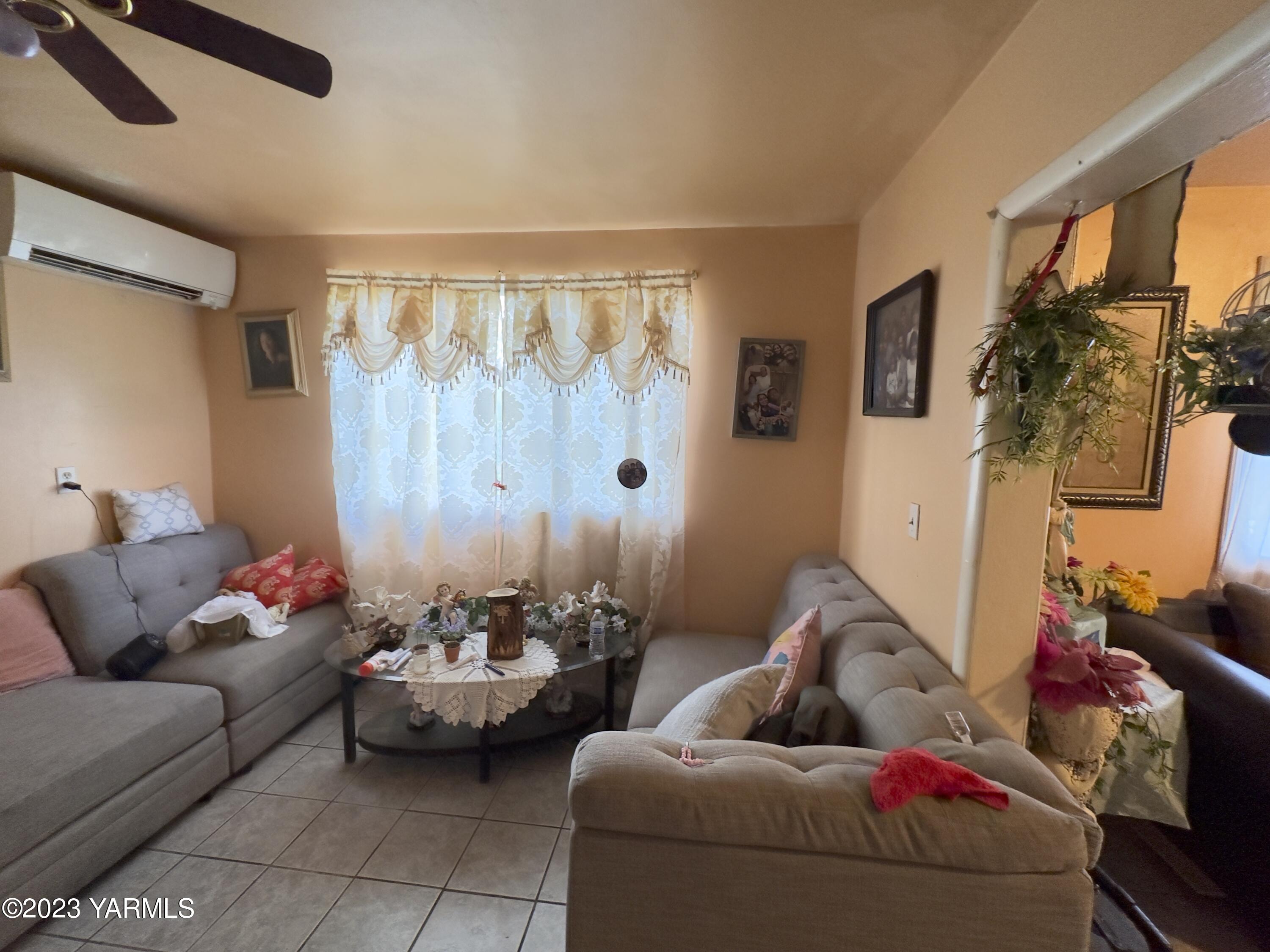 450 Main Street Parker, WA 98939 - Photo 11 of 18 a living room with furniture and a large window