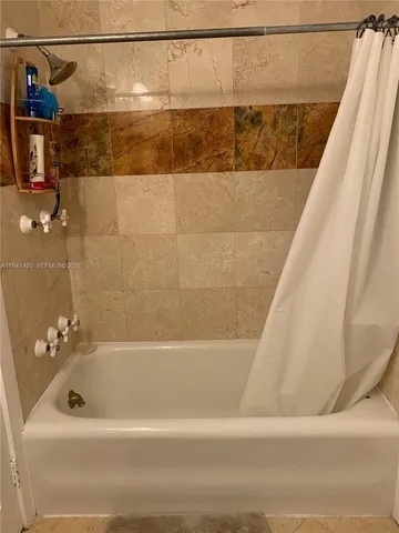 a bathroom with a bathtub