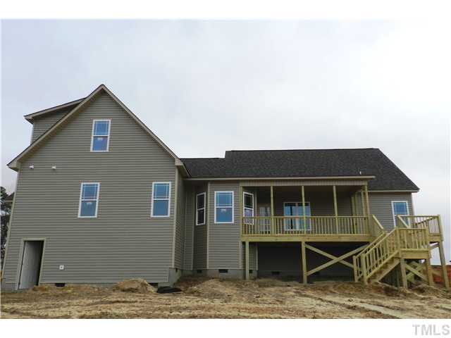 100 North Sunset Ridge Drive, Unit JADE2 Willow Spring, NC 27592 - Photo 3 of 6 a front view of a house with a porch