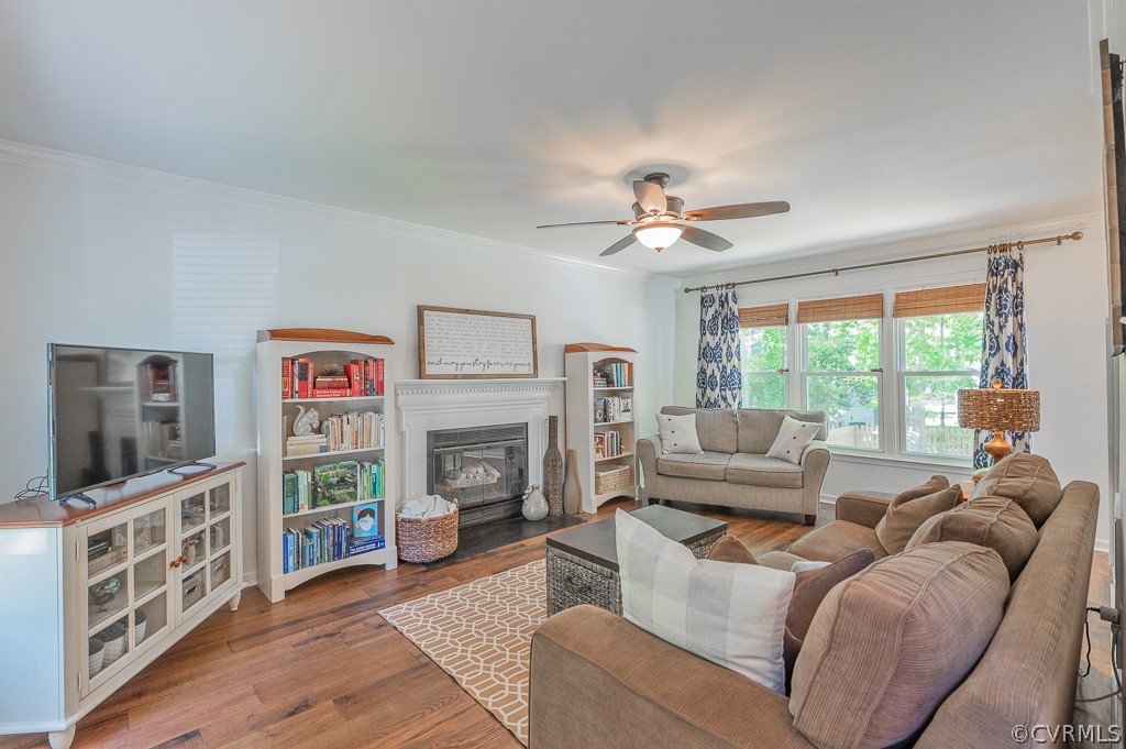 5906 Acorn Ridge Court Midlothian, VA 23112 - Photo 14 of 48 a living room with furniture and a fireplace