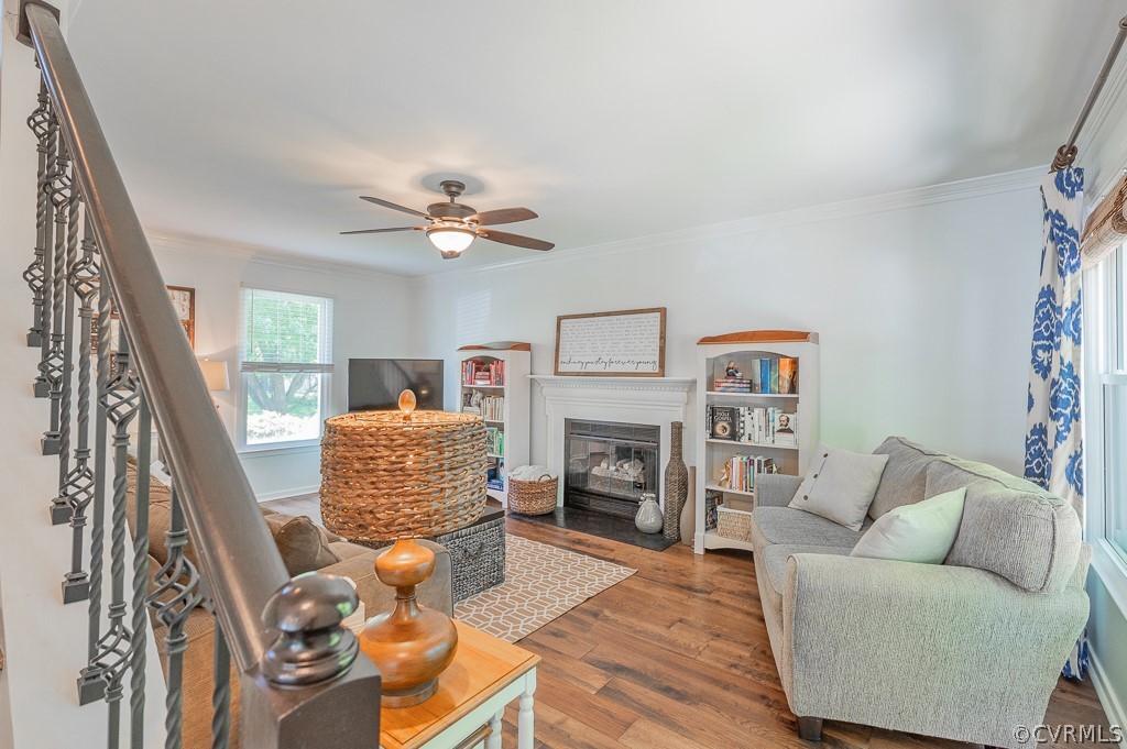 5906 Acorn Ridge Court Midlothian, VA 23112 - Photo 16 of 48 a living room with furniture and a fireplace