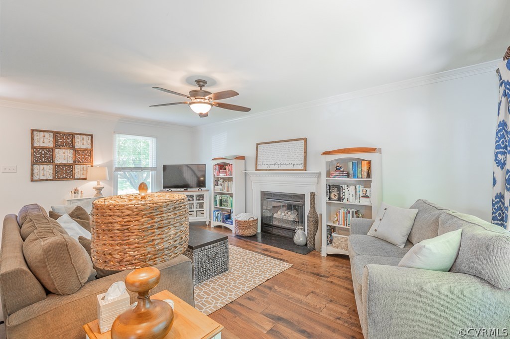 5906 Acorn Ridge Court Midlothian, VA 23112 - Photo 17 of 48 a living room with furniture and a fireplace