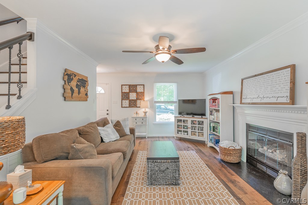5906 Acorn Ridge Court Midlothian, VA 23112 - Photo 18 of 48 a living room with furniture and a fireplace