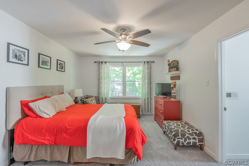5906 Acorn Ridge Court Midlothian, VA 23112 - Photo 21 of 48 a bedroom with a bed and window
