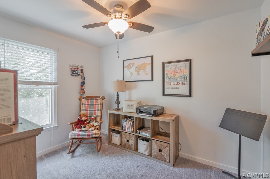5906 Acorn Ridge Court Midlothian, VA 23112 - Photo 31 of 48 a living room with furniture a baby crib and a window