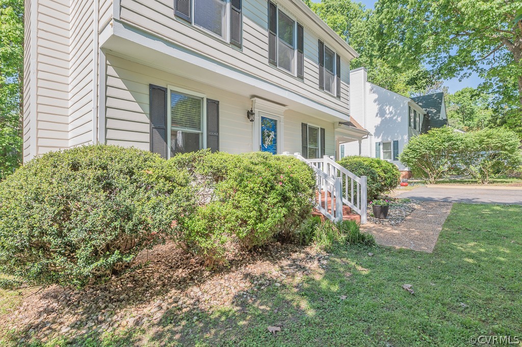 5906 Acorn Ridge Court Midlothian, VA 23112 - Photo 39 of 48 front view of a house with a yard