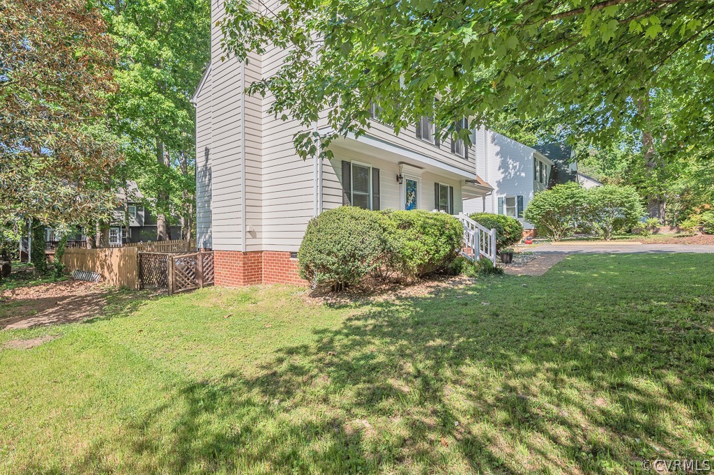 5906 Acorn Ridge Court Midlothian, VA 23112 - Photo 46 of 48 a view of a house with yard and a garden