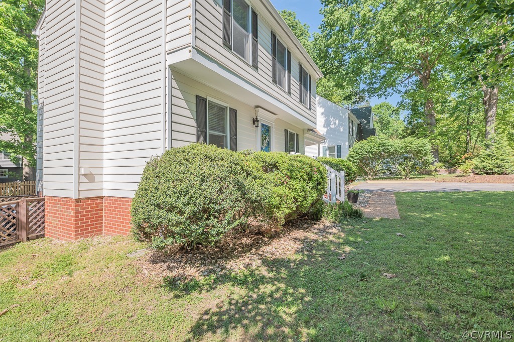 5906 Acorn Ridge Court Midlothian, VA 23112 - Photo 47 of 48 a view of a house with a yard