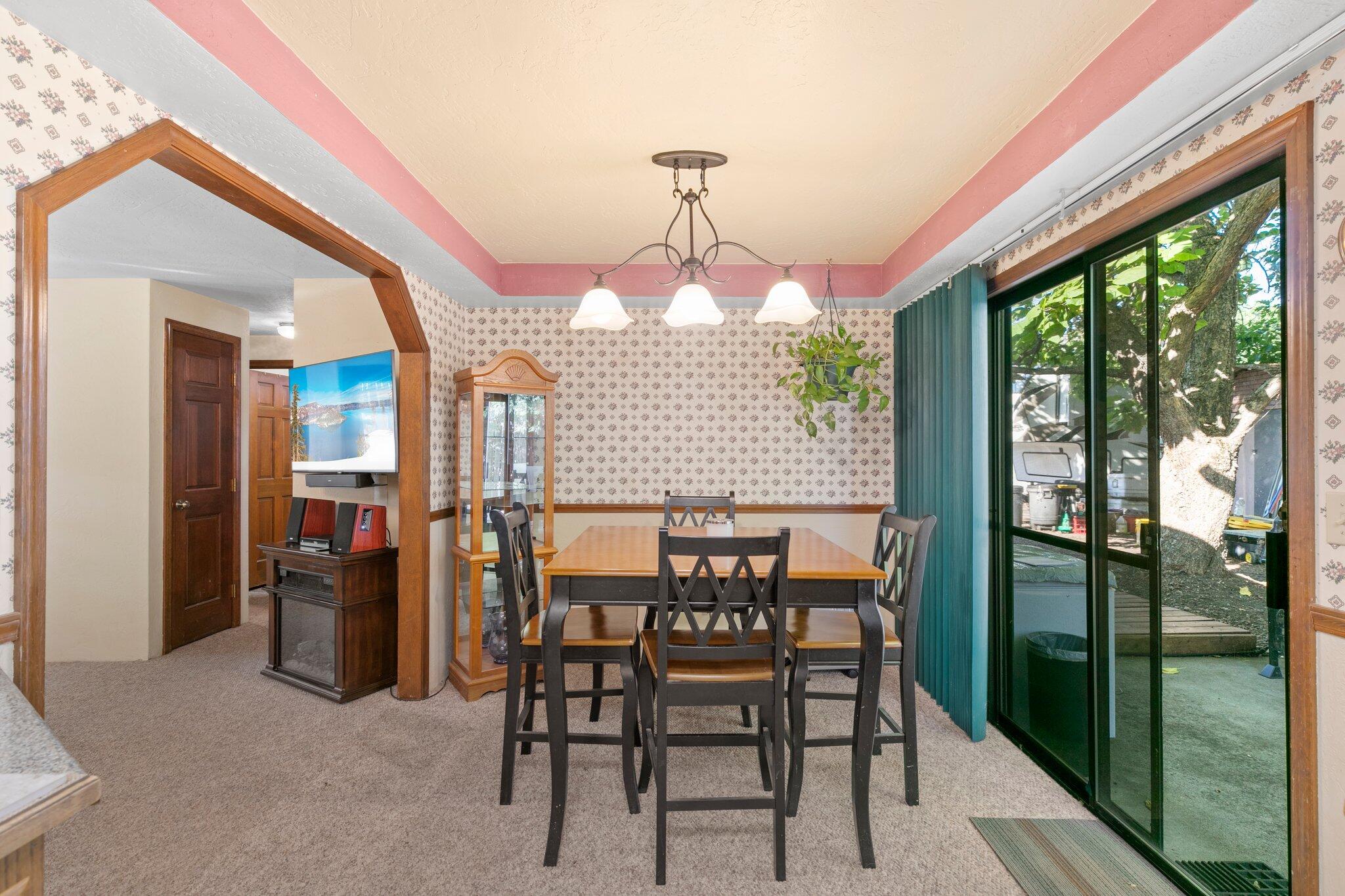 2592 Merriman Road Medford, OR 97501 - Photo 10 of 26 a view of a dining room with furniture window and outside view