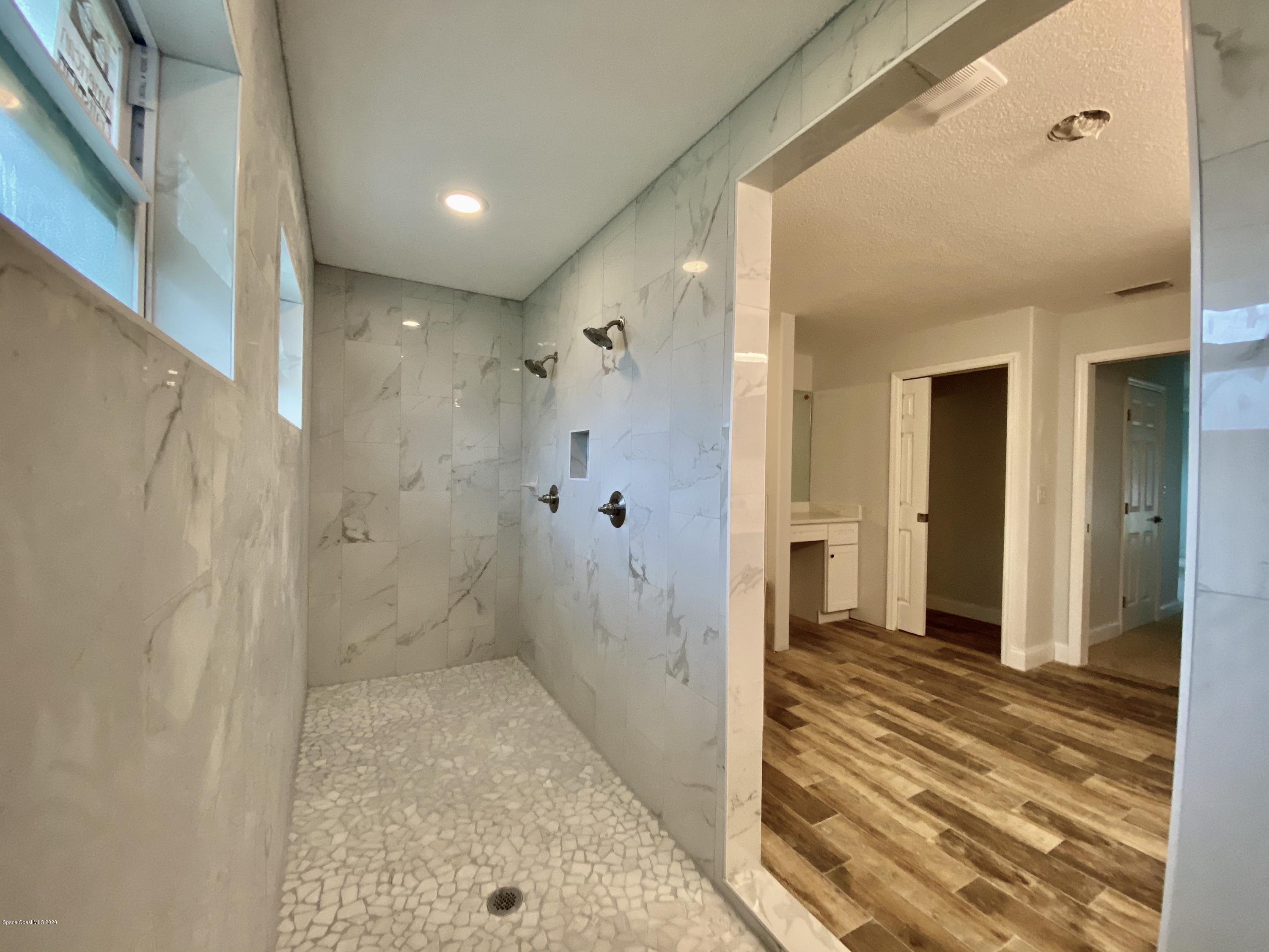 6444 Hudson Road Cocoa, FL 32927 - Photo 16 of 21 a bathroom with a shower and a sink