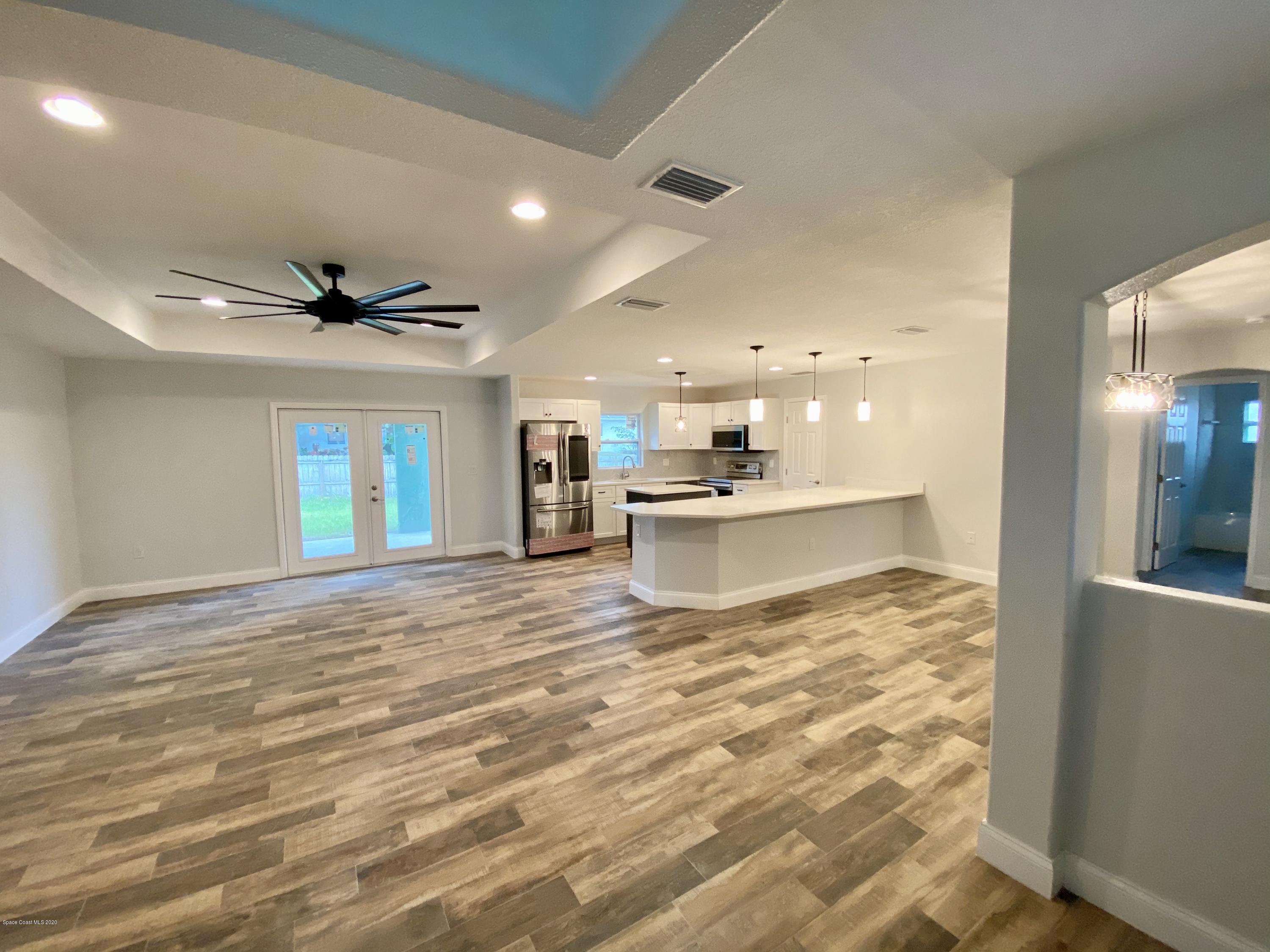 6444 Hudson Road Cocoa, FL 32927 - Photo 3 of 21 a view of kitchen and kitchen with sink