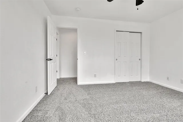 a view of a hallway with washer and dryer