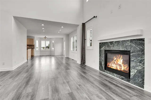 a living room with a fireplace