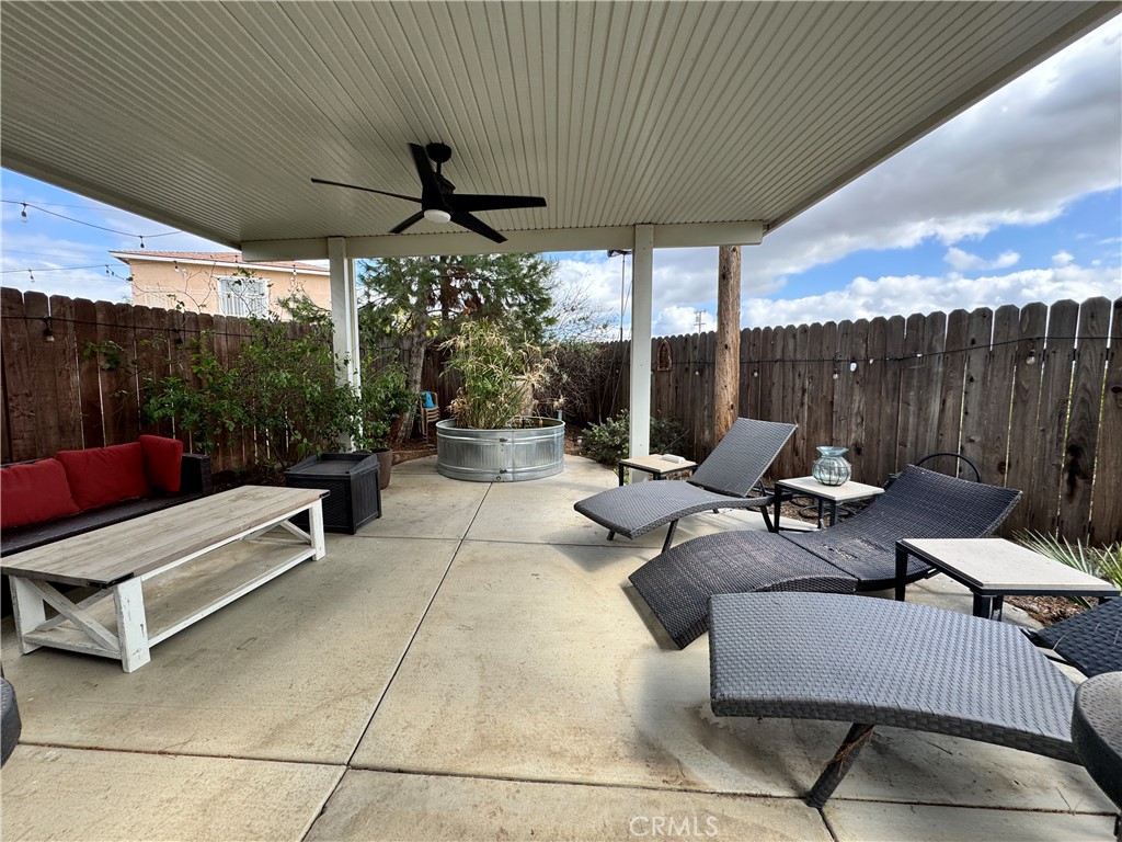 40451 Rome Beauty Way Cherry Valley, CA 92223 - Photo 14 of 25 a patio with patio couch and table