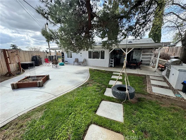 a view of a back yard of the house