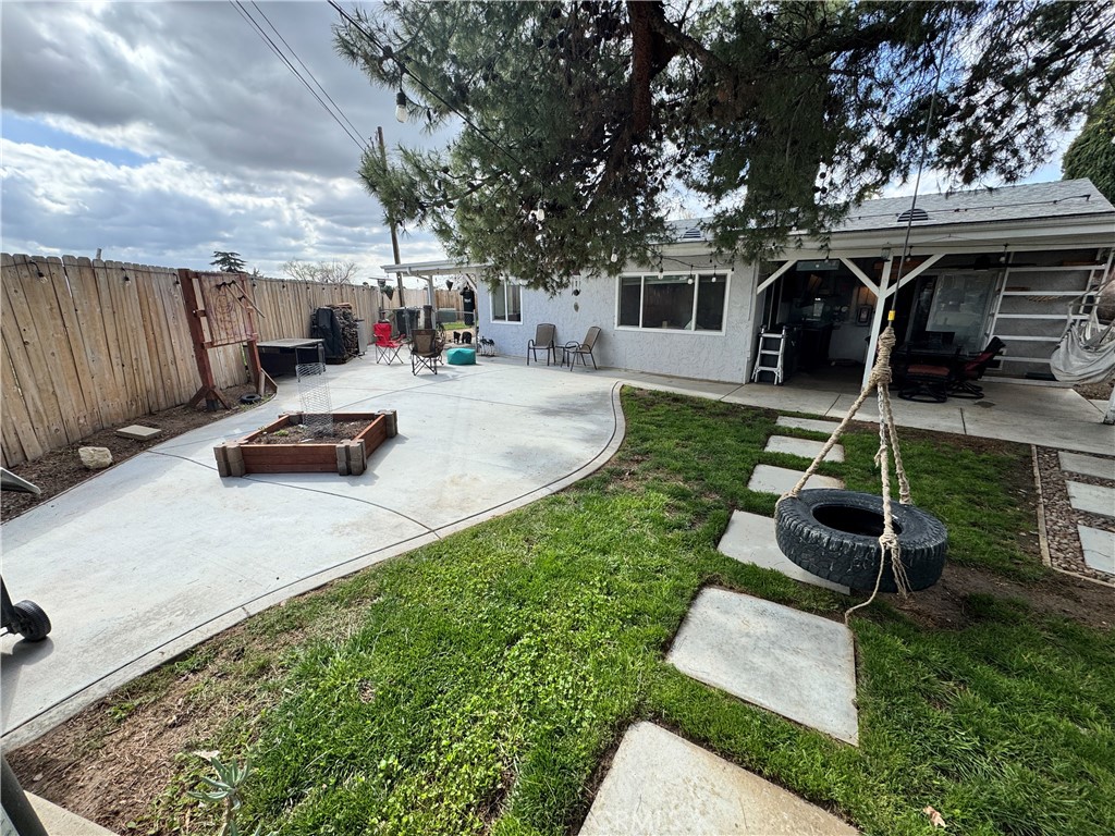 40451 Rome Beauty Way Cherry Valley, CA 92223 - Photo 4 of 25 a view of a backyard with furniture