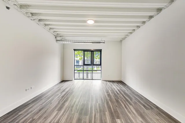 a bathroom with a double vanity sink a mirror and a shower