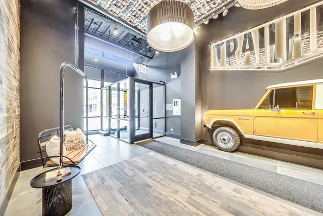 a outdoor space with furniture and city view