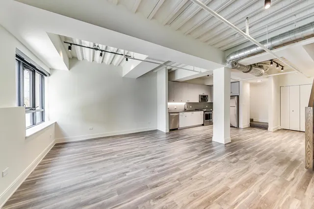 a bathroom with a sink and vanity