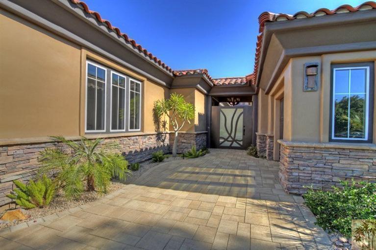 114 Loch Lomond Road Rancho Mirage, CA 92270 - Photo 7 of 37 a front view of a house