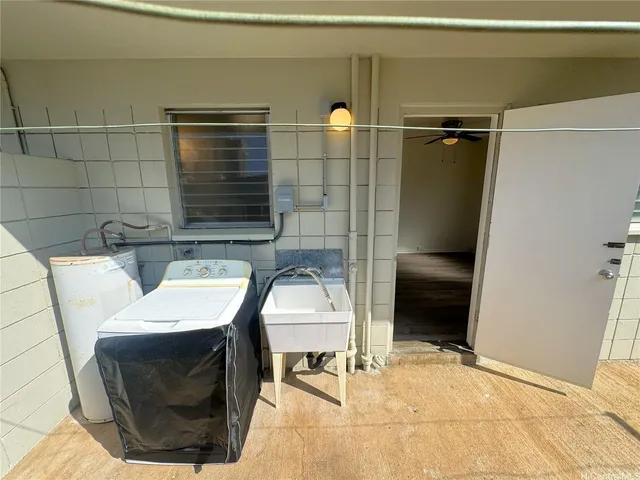a view of a balcony with dining area