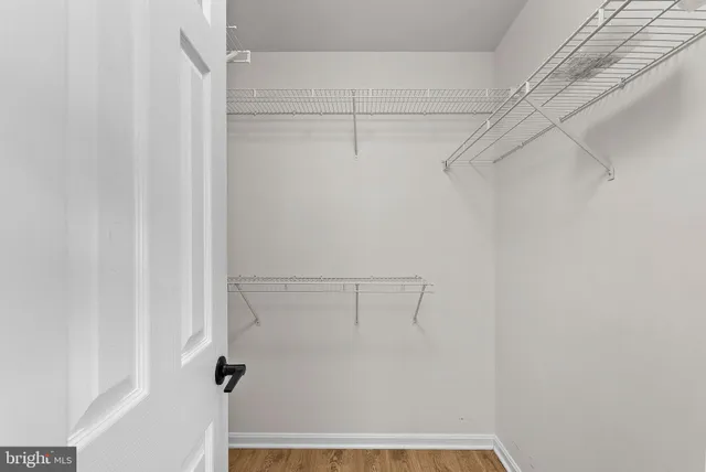 a bathroom with a sink a toilet a shower and a mirror