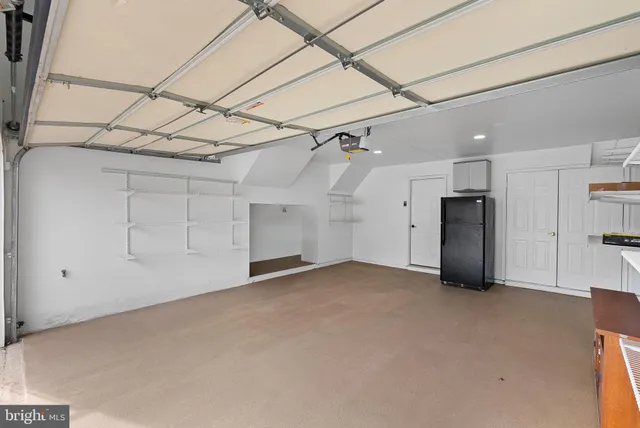 a view of a balcony with wooden floor and fence