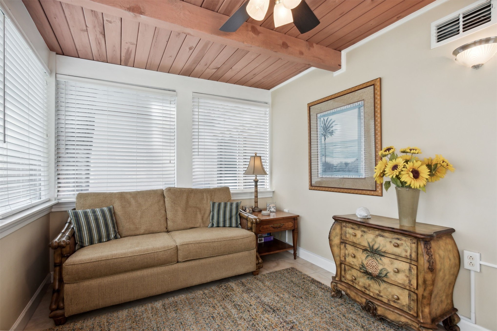 3327 Sea Marsh Road, Unit 3327 Fernandina Beach, FL 32034 - Photo 14 of 39 a living room with furniture and a potted plant