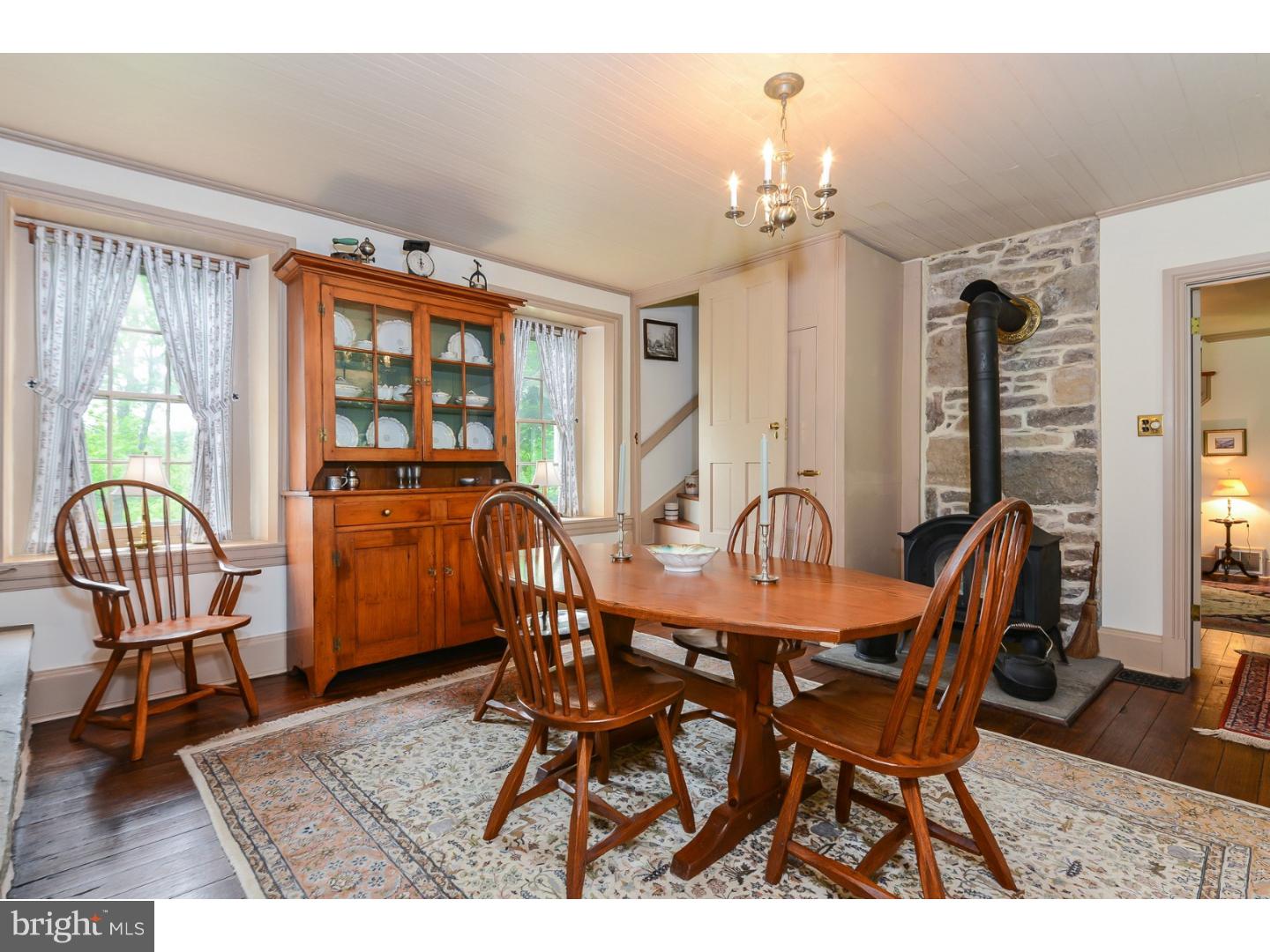1500 Sacketts Ford Road Warminster, PA 18974 - Photo 8 of 43 Dining Room with a Wood Burning Stove