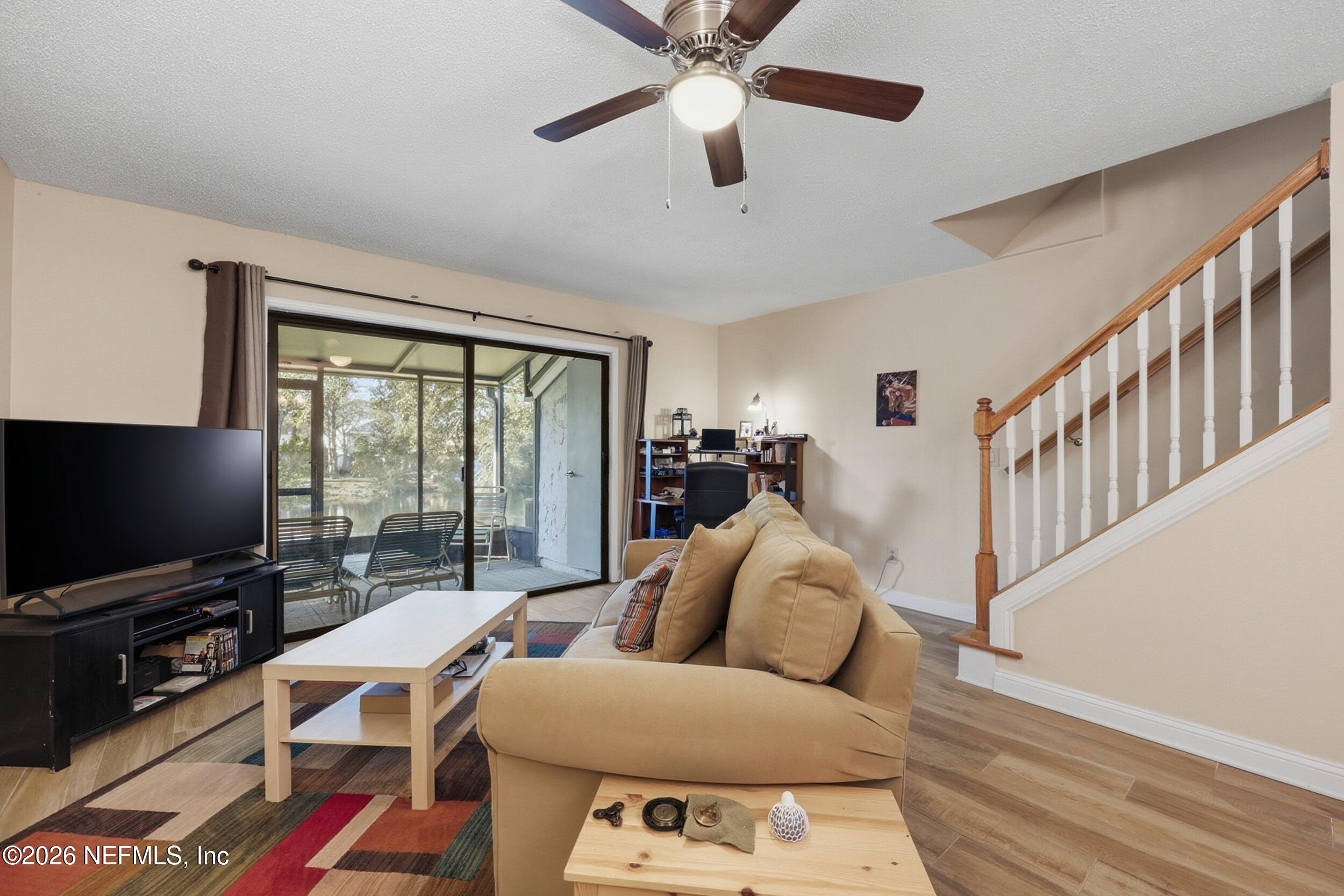 8715 Belle Rive Boulevard, Unit 1607 Jacksonville, FL 32256 - Photo 10 of 33 Living Room