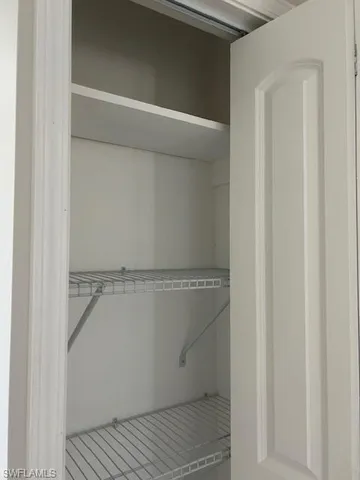 a view of an empty walk in closet