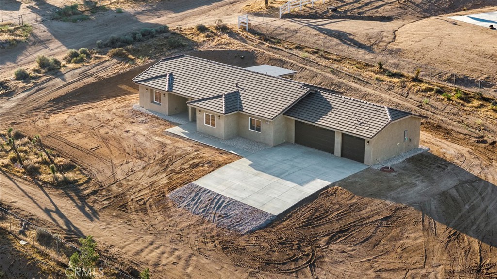 22324 Rancho Street Apple Valley, CA 92308 - Photo 40 of 47 a view of a house with a yard