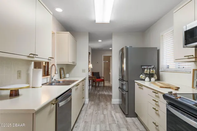 a white toilet sitting next to a bath tub and shower