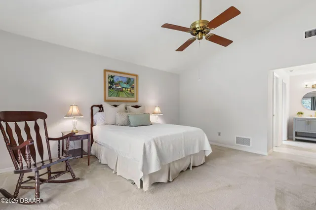 an aerial view of house with yard swimming pool and outdoor seating