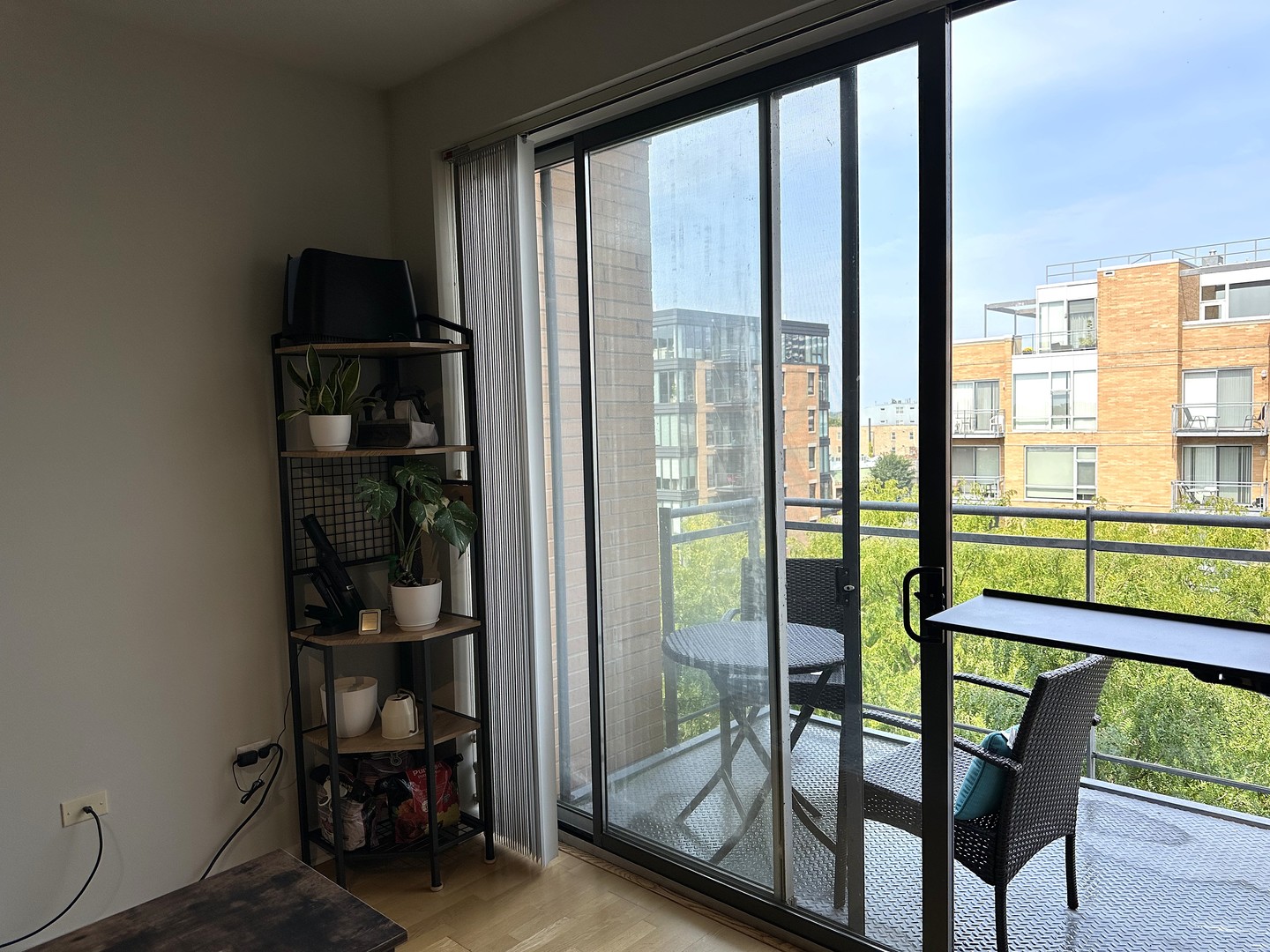 1720 Oak Avenue, Unit 706 Evanston, IL 60201 - Photo 18 of 27 a room with lots of furniture and a potted plant