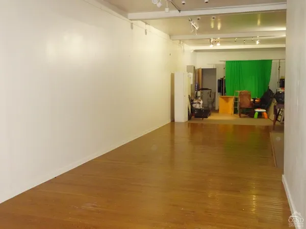 a front view of a house with parking space