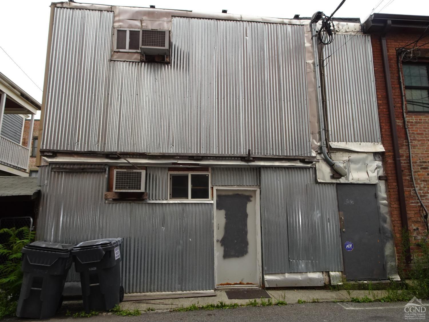 0 Warren Street Hudson, NY 12534 - Photo 7 of 7 a front view of a house with parking space
