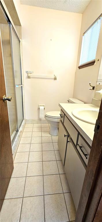 10838 Southwest 78th Court Ocala, FL 34476 - Photo 15 of 32 a bathroom with a sink toilet and shower