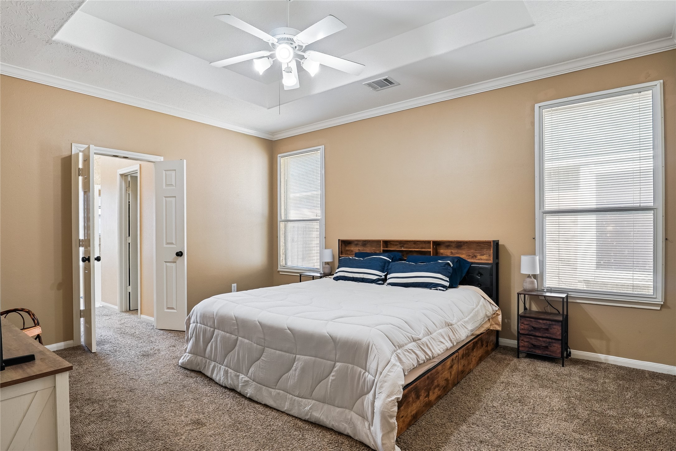 5710 Shady Hollow Court Rosharon, TX 77583 - Photo 14 of 25 a bedroom with a bed dresser and a window
